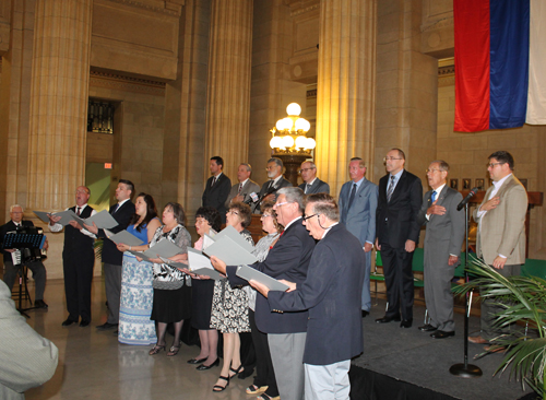 Zarja Singing Society leading the national anthems